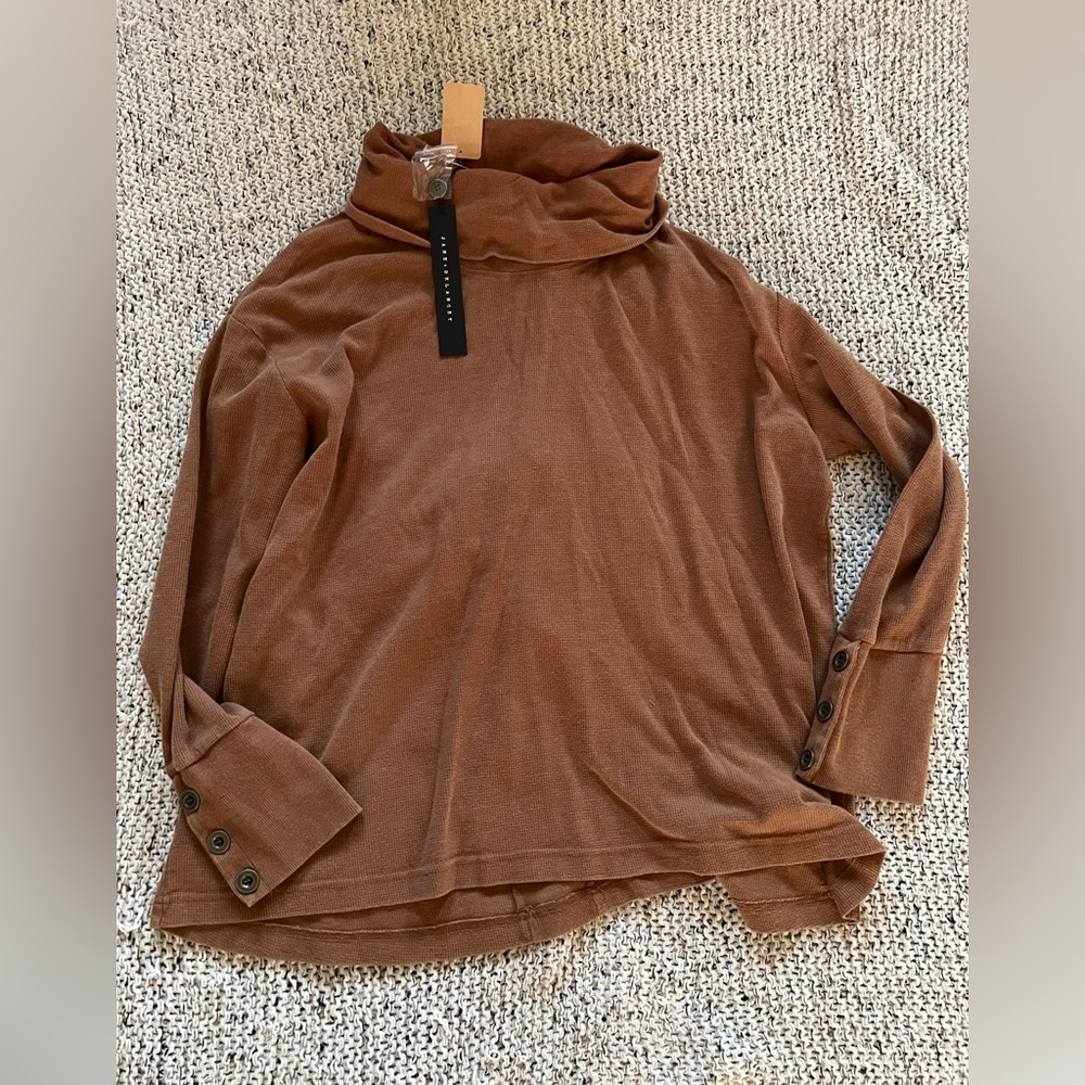 Jane & Delancey long sleet turtle neck type top.